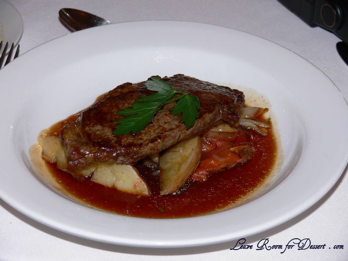 Sirloin of Beef on Roasted Potatoes, Tomato, Onion, Rosemary and Garlic Compote