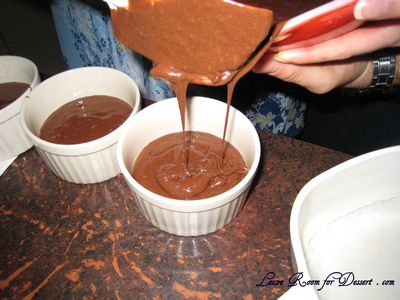 Pour the cake mix into the ramekins