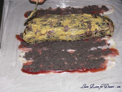 Overlap proscuitto, spread with blended mushrooms and place mustard coated beef fillet on top