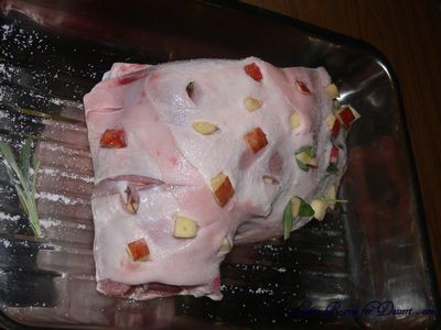 roast_pork_uncooked Apple and sage stuck into pork