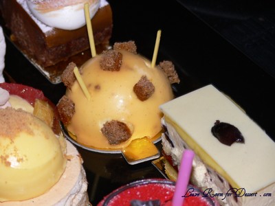 “P” - Mandarin mousse, tonka bean brulee, pain d’epice, sour cream jelly, almond ginger crunch disc.