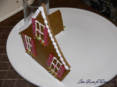 I did one wall first (held up by a glas as it is a leaning wall) then the back of the house.